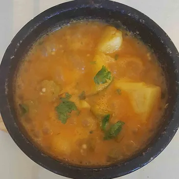 Traditional Yemeni Saltah Stew with Fenugreek Foam